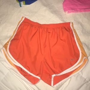orange nike shorts